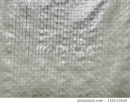 shimmering silver metallic grid weave texture closeup reflective abstract pattern background shimmering silver metallic grid weave texture closeup reflective abstract pattern background 139213648