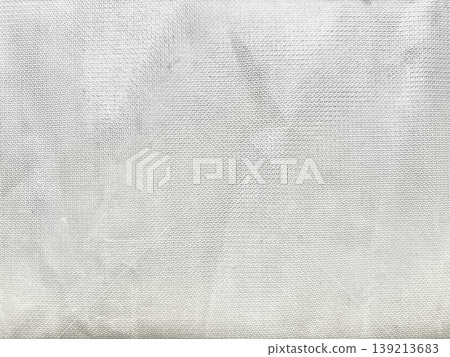 white perforated fabric texture closeup with subtle wrinkles and dotted mesh pattern evoking clean minimalist elegance white perforated fabric texture closeup with subtle wrinkles and dotted mesh pattern evoking clean minimalist elegance 139213683