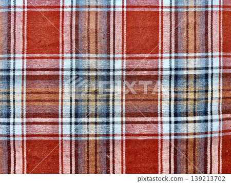 rustic red plaid fabric texture interwoven blue brown white stripes closeup pattern rustic red plaid fabric texture interwoven blue brown white stripes closeup pattern 139213702
