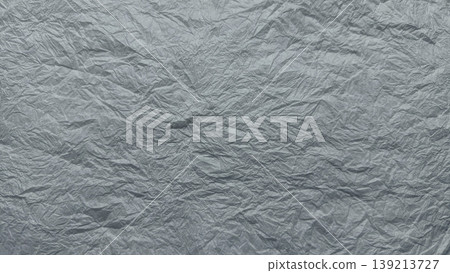 crumpled silver foil texture background intricate wrinkles folds metallic sheen abstract industrial minimalism neutral gray palette crumpled silver foil texture background intricate wrinkles folds metallic sheen abstract industrial minimalism neutral gray palette 139213727