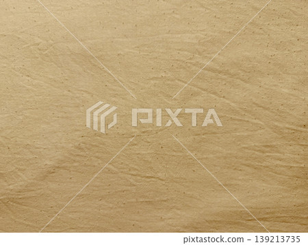 crumpled brown kraft paper texture closeup revealing intricate wrinkles speckles and natural folds on soft pastel blue backdrop evoking organic minimalism for creative overlays crumpled brown kraft paper texture closeup revealing intricate wrinkles speckles and natural folds on soft pastel blue backdrop evoking organic minimalism for creative overlays 139213735