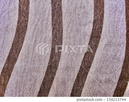 undulating brown wavy stripes textured fabric closeup abstract neutral tones serene flowing pattern background undulating brown wavy stripes textured fabric closeup abstract neutral tones serene flowing pattern background 139213744