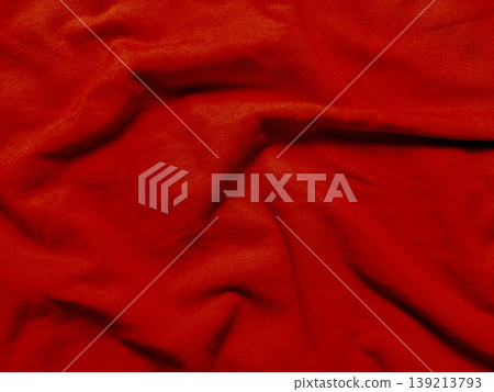 crimson fabric wrinkles cascading in soft folds macro texture evoking vibrant warmth for design backgrounds crimson fabric wrinkles cascading in soft folds macro texture evoking vibrant warmth for design backgrounds 139213793