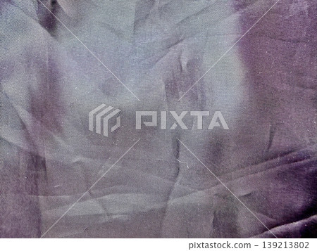 ethereal purple fabric wrinkles blending lavender gradients in abstract textured backdrop 139213802