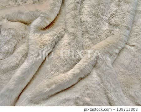 creamy white fur texture draped elegantly in soft waves macro closeup luxurious fabric folds creamy white fur texture draped elegantly in soft waves macro closeup luxurious fabric folds 139213808