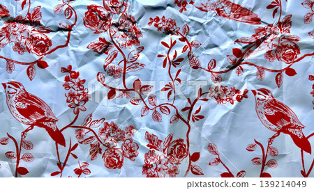 crumpled red bird floral print on blue foil paper texture crumpled red bird floral print on blue foil paper texture 139214049