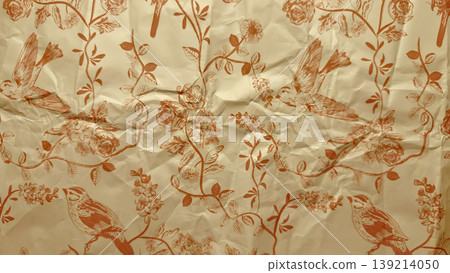 vintage crumpled bird and rose pattern on beige paper texture featuring flying sparrows amid blooming vines in sepia tones vintage crumpled bird and rose pattern on beige paper texture featuring flying sparrows amid blooming vines in sepia tones 139214050