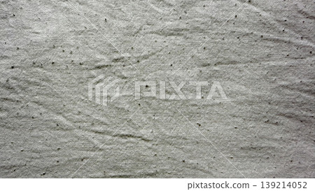 textured burlap fabric closeup revealing intricate weave patterns subtle wrinkles and scattered specks evoking rustic natural authenticity textured burlap fabric closeup revealing intricate weave patterns subtle wrinkles and scattered specks evoking rustic natural authenticity 139214052