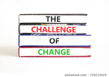 The challenge of change words symbol. Concept words The challenge of change on beautiful books. Beautiful white background. Business the challenge of change concept. Copy space. 139214429