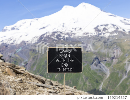 Begin with the end in mind symbol. Concept words Always begin with the end in mind on beautiful blackboard. Beautiful mountain Elbrus background. Business begin with the end in mind concept Copy space Begin with the end in mind symbol. Concept words Always begin with the end in mind on beautiful blackboard. Beautiful mountain Elbrus background. Business begin with the end in mind concept Copy space 139214837