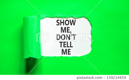 Tell or show symbol. Concept words Show me, do not tell me on beautiful white paper. Beautiful green paper background. Business tell or show concept. Copy space. Tell or show symbol. Concept words Show me, do not tell me on beautiful white paper. Beautiful green paper background. Business tell or show concept. Copy space. 139214859