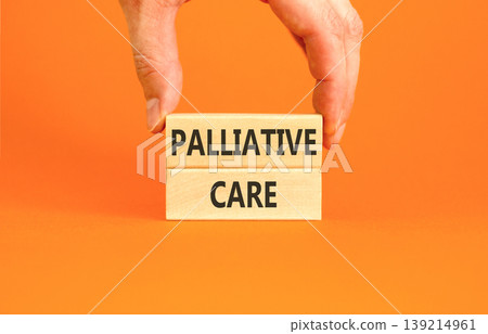 Palliative care words symbol. Concept words Palliative care on beautiful wooden blocks. Beautiful orange background. Doctor hand. Medical and Palliative care words concept. Copy space. Palliative care words symbol. Concept words Palliative care on beautiful wooden blocks. Beautiful orange background. Doctor hand. Medical and Palliative care words concept. Copy space. 139214961