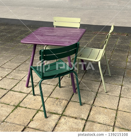 A chic colored table and chairs, a scene with a table and chairs. 139215108