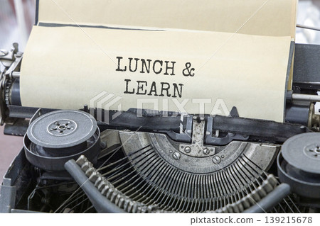 Lunch and learn symbol. Concept words Lunch and learn typed on beautiful old retro typewriter. Beautiful white paper background. Business, educational and lunch and learn concept. Copy space. Lunch and learn symbol. Concept words Lunch and learn typed on beautiful old retro typewriter. Beautiful white paper background. Business, educational and lunch and learn concept. Copy space. 139215678