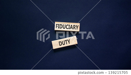Fiduciary duty words symbol. Concept words Fiduciary duty on beautiful wooden blocks. Beautiful black background. Business and Fiduciary duty words concept. Copy space. 139215705