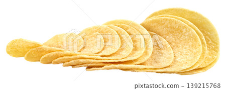 Stack of thin and crispy potato chips isolated. Golden yellow salty snacks arranged in a neat row. Tasty fast food and junk food appetizer for parties. Close up studio shot. 139215768