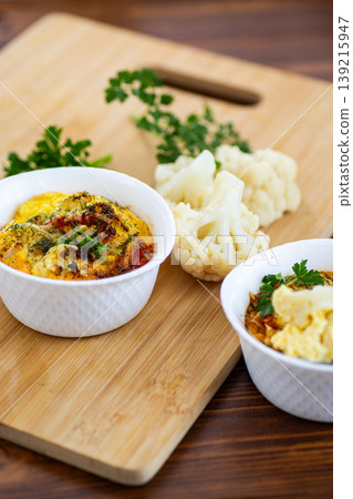 fluffy omelet with cauliflower served with spoon and garnish fluffy omelet with cauliflower served with spoon and garnish 139215947