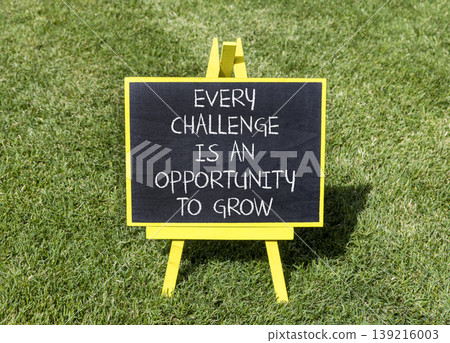 Challenge word symbol. Concept words Every challenge is an opportunity to grow on beautiful black blackboard. Beautiful green grass background. Business challenge is an opportunity concept. Copy space Challenge word symbol. Concept words Every challenge is an opportunity to grow on beautiful black blackboard. Beautiful green grass background. Business challenge is an opportunity concept. Copy space 139216003