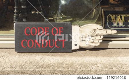 Code of conduct words symbol. Concept words Code of conduct on beautiful black wooden sign. Beautiful shopfront background. Business Code of conduct concept. Copy space. Code of conduct words symbol. Concept words Code of conduct on beautiful black wooden sign. Beautiful shopfront background. Business Code of conduct concept. Copy space. 139216018