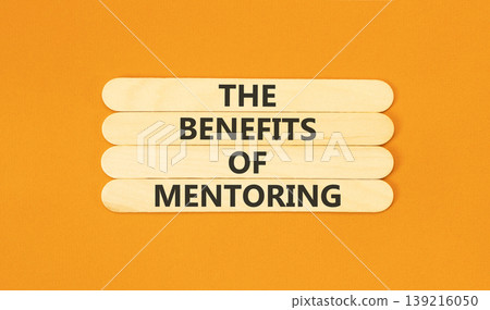 Benefits of mentoring words symbol. Concept words The benefits of mentoring on beautiful wooden sticks. Beautiful orange background. Business the benefits of mentoring concept. Copy space. Benefits of mentoring words symbol. Concept words The benefits of mentoring on beautiful wooden sticks. Beautiful orange background. Business the benefits of mentoring concept. Copy space. 139216050