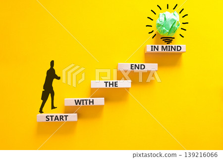 Start with the end in mind symbol. Concept words Start with the end in mind on beautiful wooden blocks. Beautiful yellow paper background. Business start with the end in mind concept. Copy space. Start with the end in mind symbol. Concept words Start with the end in mind on beautiful wooden blocks. Beautiful yellow paper background. Business start with the end in mind concept. Copy space. 139216066