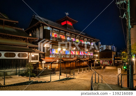 Dogo Onsen Main Building at night and the colorful illuminations Dogo Onsen Main Building at night and the colorful illuminations 139216089