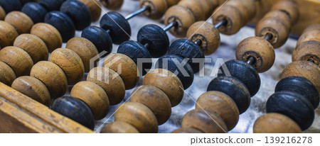 Traditional wooden abacus with black and brown beads, banner background 139216278