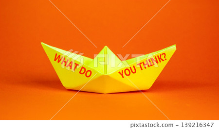 What do you think words symbol. Concept words What do you think on beautiful yellow paper boat. Beautiful orange background. Business What do you think motivational support concept. Copy space. What do you think words symbol. Concept words What do you think on beautiful yellow paper boat. Beautiful orange background. Business What do you think motivational support concept. Copy space. 139216347