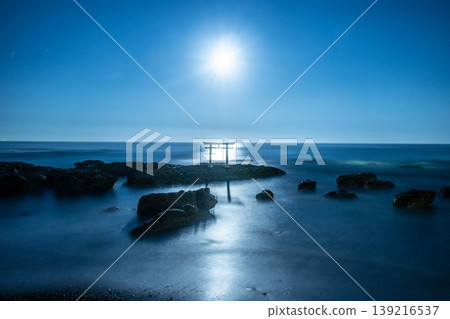 The "Kamiiso Torii" gate standing on a rocky outcrop, illuminated by moonlight. The "Kamiiso Torii" gate standing on a rocky outcrop, illuminated by moonlight. 139216537