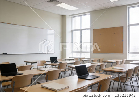 Modern empty classroom with laptops and whiteboards ready for learning Modern empty classroom with laptops and whiteboards ready for learning 139216942
