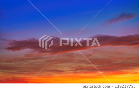 Sunset sky clouds orange and blue Sunset sky clouds orange and blue 139217753