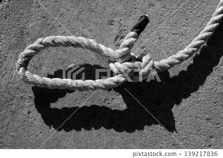 black and white bowline gauze on marine rope black and white bowline gauze on marine rope 139217836