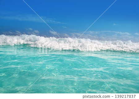 blue turquoise wave caribbean sea water foam 139217837