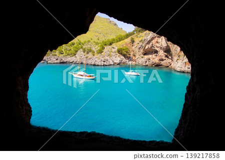 Escorca Sacalobra beach view from cave window Escorca Sacalobra beach view from cave window 139217858
