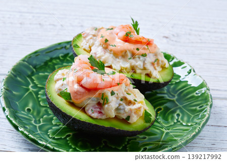 Seafood filled avocado with shrimps tapas pinchos Seafood filled avocado with shrimps tapas pinchos 139217992