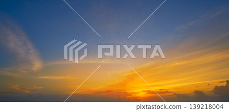 Colorful sunset sky in blue and orange Colorful sunset sky in blue and orange 139218004