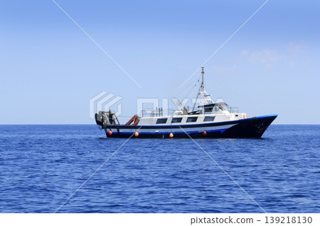 trawler boat working in mediterranean offshore trawler boat working in mediterranean offshore 139218130