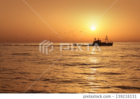 Fisherboat professional sardine catch fishery sunrise Fisherboat professional sardine catch fishery sunrise 139218131