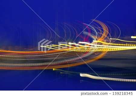 Abstract night blurry colorful lighs over blue Abstract night blurry colorful lighs over blue 139218345