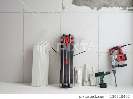 construction tools as tiles cutter electric hammer drill 139218402