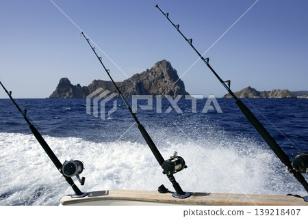 Blue Mediterranean fishing boat rod and reels Blue Mediterranean fishing boat rod and reels 139218407