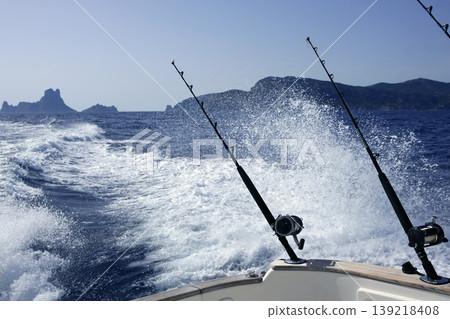 Blue Mediterranean fishing boat rod and reels Blue Mediterranean fishing boat rod and reels 139218408