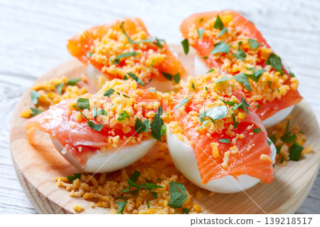 Filled eggs with salmon pinchos tapa Spain Filled eggs with salmon pinchos tapa Spain 139218517