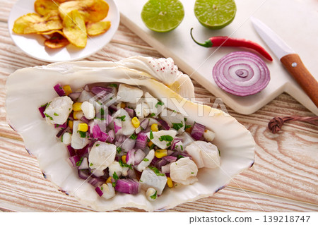 Ceviche peruvian recipe with fried banana Ceviche peruvian recipe with fried banana 139218747