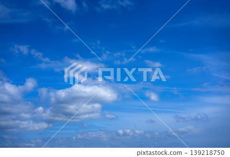 Blue sky white summer cumulus clouds Blue sky white summer cumulus clouds 139218750