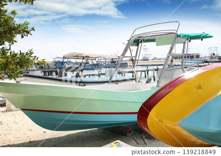 boats colorful in Isla Mujeres beach Mexico boats colorful in Isla Mujeres beach Mexico 139218849