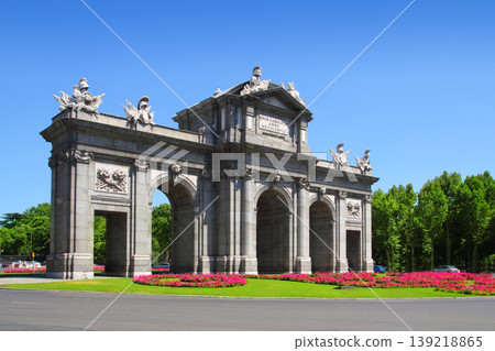 Madrid Puerta de Alcala with flower gardens Madrid Puerta de Alcala with flower gardens 139218865