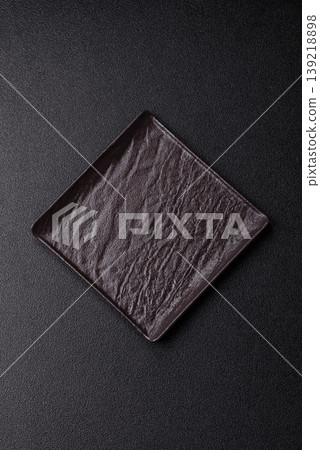 A blank slate board on a dark background for Asian food. A blank slate board A blank slate board on a dark background for Asian food. A blank slate board 139218898