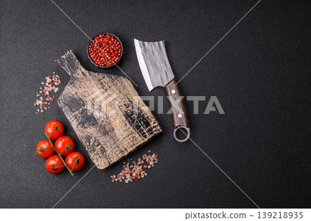 An empty wooden cutting board, kitchen utensils for food preparation. An empty cutting board An empty wooden cutting board, kitchen utensils for food preparation. An empty cutting board 139218935