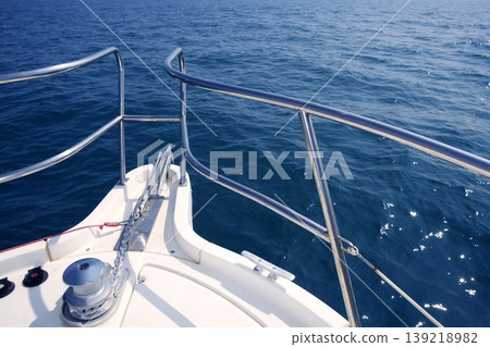 boat bow sailing sea with anchor chain winch boat bow sailing sea with anchor chain winch 139218982